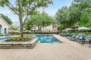 Beautiful Pool with lots of seating/tanning chairs