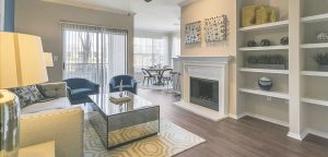 Living room with built in shelves, fireplace