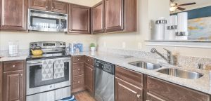 Kitchen with stainless steel appliances and Granite Countertops