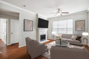 Living room with fireplace and large window