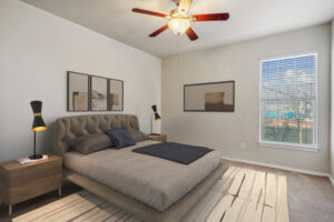 Bedroom with large windows and ceiling room