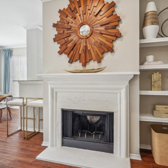 Living room with fire place and built in shelves