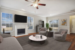 Living room with fire place and large windows