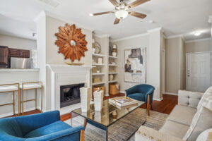 Living room with fire place and built in shelves