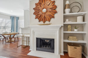 Living room with fire place and built in shelves