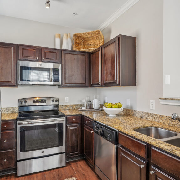 Kitchen with granite counters and stainless steel appliances